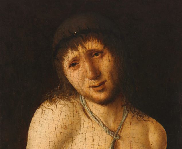 A close-up Renaissance painting depicts Christ half-length against a dark background, his bare torso softly lit, head tilted and eyes lowered in a quiet, sorrowful expression beneath a crown of thorns.