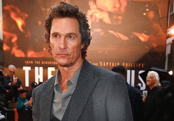 Matthew McConaughey in a gray suit.
