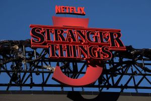 A sign above the main Fairfax stage is seen during the 'Netflix x CicLAviaMelrose Ave: Stranger Things 5 One Last Ride' down Melrose Avenue